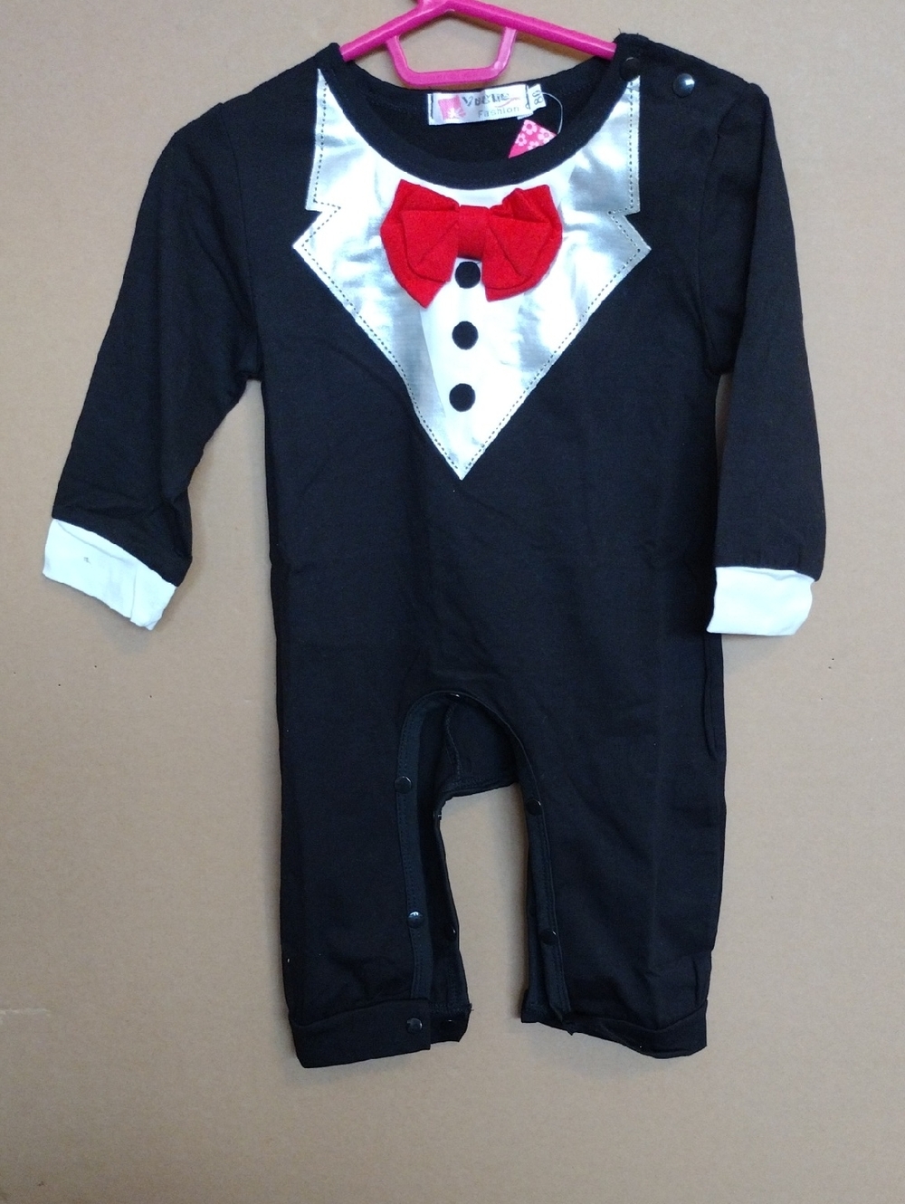 Vogue Black One-Piece Tuxedo with Red Bow
